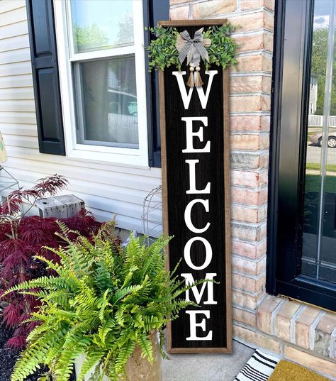 PRICES MAY VARY. 【Highquality Material】: the hanging vertical welcome sign for front porch is made of natural and quality wood material, sturdy and reliable to use, It is printed with weatherproof UV Inks that won’t fade, peel or crack. 【Perfect Size】: Welcome sign is 45" tall and 9" wide , 1" thick, weighs 2.5 lb. Ready to hang anywhere you want guests to see in your home, such as the porch, yard, entrances, entryways, front porches and walls and any conspicuous position. 【Exquisite Craftsmansh Tall Welcome Sign Front Porches, Welcome Sign Front Door Entrance, Open Front Porch Ideas, Vertical Porch Signs, Wood Porch Signs, Above Door Decor, Welcome Signs For Front Door, Outdoor Porch Ideas, Door Leaner