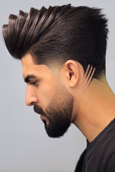 Pompadour Fade #pompadour #pompadourmen Do you fancy a pompadour hairstyle? It can add a royal touch to your look. With such a haircut, it’s much easier than it seems. Being named after a mistress of King Louis XV, it was formerly worn by women. However, another King, the King of Rock’n’Roll Elvis Presley, was the one who popularized it among men and made it the most stylish haircut ever since. Are you ready to bring out your inner King? #menshaircuts #menshairstyles Pompadour Haircut, Pompadour Fade, Gents Hair Style, Pompadour Hairstyle, Latest Haircuts, Cool Mens Haircuts, Men Haircut Styles, Cool Hairstyles For Men, Fresh Hair