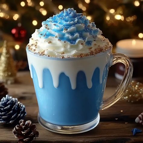 Frostbite Blue Christmas Cocoa: A Festive, Creamy Winter Treat - Grammy Recipes Frostbite Blue Christmas Cocoa, Blue Hot Chocolate, Grammy Recipes, Marshmallow Drink, Fun Holiday Drinks, Christmas Drinks Recipes, Christmas Cocoa, Refreshing Recipes, Drinks Christmas