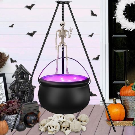 PRICES MAY VARY. Halloween Witch Cauldron Decoration Set: This Halloween outdoor decoration set includes a tripod and a large witch cauldron, string purple light, spider cotton and a mini skeleton decor, Ideal for both indoor and outdoor settings, it adds a mystical and eerie touch to your Halloween decor Unique Halloween Design: The witches cauldronboasts a shiny black finish, waterproof purple string lights equipped (requires 3AA batteries, not included) and spider cotton, Cauldron with purple Cute Halloween Yard Decor, Halloween Exterior Decorations, Halloween Witches Decorations Outdoor, Witch Party Decor, Disney Halloween Yard Decorations, Front Porch Halloween Decorations, Diy Light Up Witches Cauldron, Witch Cauldron Decoration, Witch Cauldron Fire Pit