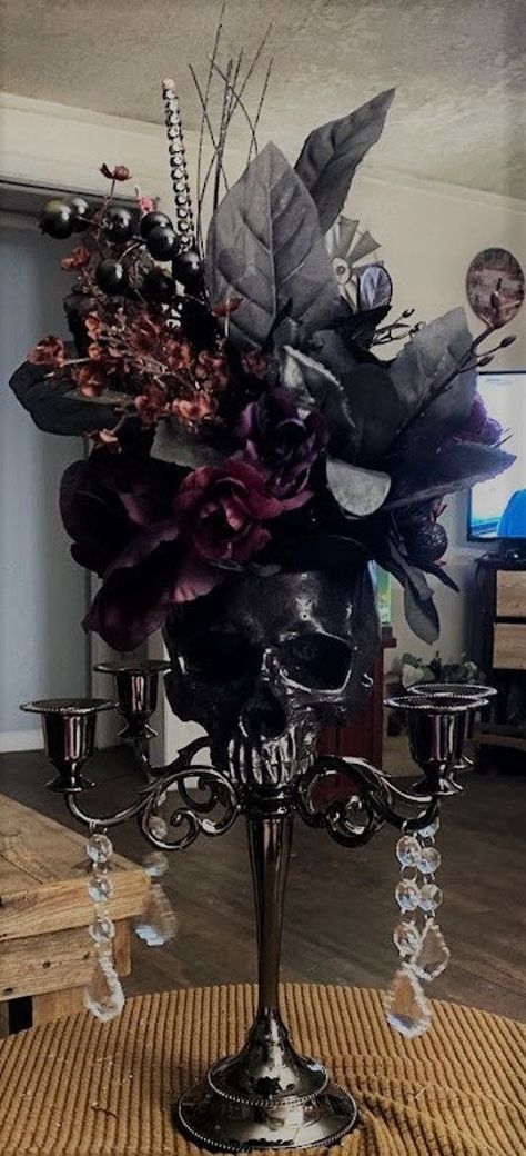 If you love gothic and you want something made special contact me.  This is some Candelabra's decor I made.  I am available to take special request and create your wedding decor too.  Everything was made by design.  I love making unique wedding bouquets and decor to fit the bride's dream for her wedding day. I will take special orders for theme, color, shape and style.    Pricing is for this centerpiece with variations.  Price will change depending on what you would like and the changes you make Skull Centerpiece, Dark Romantic Wedding, Gothic Wedding Theme, Vampire Wedding, Dark Wedding Theme, Unique Wedding Bouquet, Halloween Themed Wedding, Skull Wedding, Goth Wedding