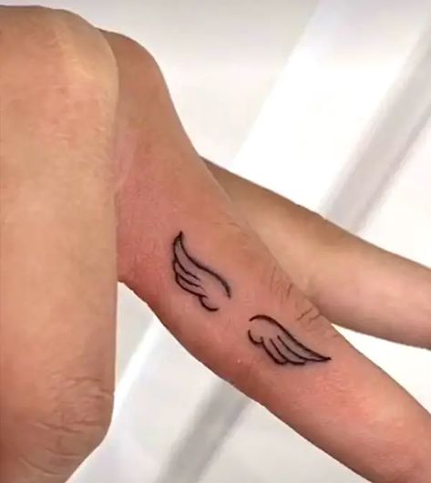 Angel Finger Tattoo, Angel Wings Finger Tattoo, Tattoos Angel Numbers, Men Finger Tattoos, Angel Wing Finger Tattoo, Wing Tattoos On Wrist, Side Finger Tattoos, Inside Finger Tattoos, Small Angel Wing Tattoo