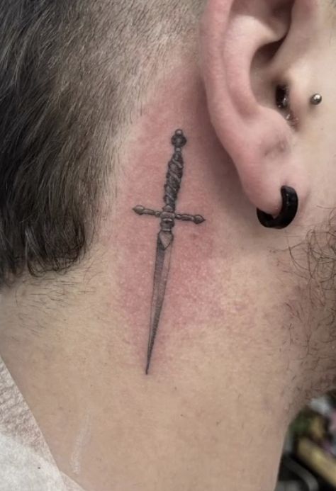 Done by @ rossnagle in allstar tattoo, Limerick, Ireland Single needle, realism, black and grey, dagger / sword Knife Tattoo Behind Ear, Small Swords Neck Tattoo, Knife Neck Tattoo, Dager Tattoos Small, Dagger Tattoo Men, Dainty Dagger Tattoo, Behind The Ear Tattoo Ideas For Men, Behind Ear Tattoo Men, Simple Dagger Tattoo