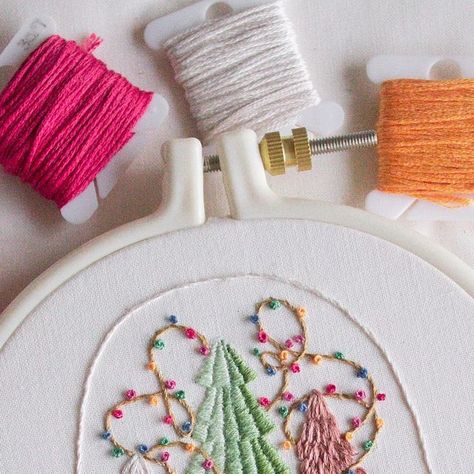 Aly Ploof on Instagram: "Today I wanted to share another pattern reveal from my new Christmas embroidery book “Handmade Holiday” coming this November! ✨ 

This pattern is called “Rainbow Snow Globe” and was inspired by the adorable cloche snow globes with mini trees and fairy lights that have become so popular recently! This pattern is definitely one of the more complex ones in the book, but such a satisfying one to stitch 🫶🏻 

You can preorder Handmade Holiday for the physical copy to be sent after Nov. 19th, or purchase the Ebook right now if you’re ready to get going. There will be a link in my bio & stories to order through! ✂️" Snow Globe Embroidery, Light Embroidery, Book Handmade, Embroidery Book, Fairy Light, Christmas Embroidery, Handmade Holiday, Snow Globe, Fairy Lights