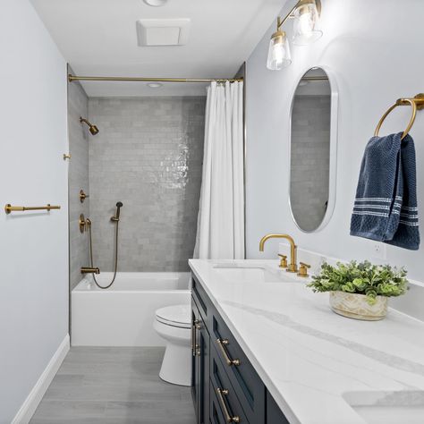 Navy, white, and gold 💙 what are your thoughts on a classic color palette like this in a bathroom? The vanity color is called Navy Masterpiece by @benjaminmoore 🏠 “Denim Blue House Tour” #bathroominspo #coastalbathroom #bluebathroom #bathroomstyle #goldbathroom Bathroom With Blue Bathtub, Classic Color Palette, White Bath, Gold Bathroom, Coastal Bathrooms, Blue Bathroom, Main Bathroom, Bathroom Update, Guest Bath