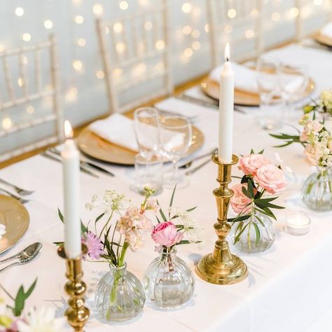 Wedding Stylist | Elizabeth on Instagram: "Keeping it simple but pretty! Brass candlestick holders and flowers in bud vases 🌸 Flowers @jennyfleurflorist Photo @bigeyephoto ⠀⠀⠀⠀⠀⠀⠀⠀⠀⠀⠀⠀⠀⠀⠀⠀⠀⠀⠀⠀⠀ ⠀⠀⠀⠀⠀⠀⠀⠀⠀⠀⠀⠀ ⠀⠀⠀⠀⠀⠀⠀⠀⠀⠀⠀⠀⠀⠀⠀⠀⠀⠀⠀⠀ ⠀⠀⠀⠀⠀⠀⠀⠀⠀⠀⠀⠀⠀⠀⠀⠀⠀⠀⠀⠀⠀ ⠀⠀⠀⠀⠀⠀⠀⠀⠀⠀⠀ ⠀⠀⠀⠀⠀⠀⠀⠀⠀⠀⠀⠀⠀⠀⠀⠀⠀⠀⠀⠀⠀⠀⠀⠀⠀⠀ ⠀⠀⠀⠀⠀⠀⠀⠀⠀⠀⠀⠀⠀⠀⠀⠀ #bespokewedding #bespokeweddingstyling #weddingstylist #weddingdecor #weddingstyling #engaged #bridetobe #ukwedding #engagement #elizabethweddings #tablescape #creativestyling #weddingdesign # Bud Vases And Gold Candlesticks, Sweetheart Table Bud Vases And Candles, Bud Vase And Candle Stick Centerpiece, Brass Candlesticks And Bud Vases, Candle Sticks And Bud Vases, Candlestick And Bud Vase Centerpiece, Tablescape Bud Vases, Head Table Bud Vases, Bud Vases And Taper Candles