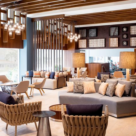 Indidesign Renovates Hilton Garden Inn Waikiki Beach Beach Hotel Lobby, Hotel Furniture Design, Clubhouse Design, Shaw Contract, Hotel Lobby Design, Lobby Interior Design, Lobby Lounge, Hotel Lounge, Home Lighting Design