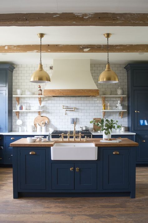 14 Blue Farmhouse Kitchen Designs for a Cozy and Timeless Look – My Kitchen Inspo Navy Butcher Block Kitchen, Gold Kitchen Faucet Blue Cabinets, Farmhouse Kitchen With Blue Accents, Kitchen Ideas Navy Cabinets, Navy And Wood Kitchen Cabinets, Navy Blue And Wood Kitchen Cabinets, Dutch Blue Kitchen, Wooden Beams Kitchen, Blue Wooden Kitchen