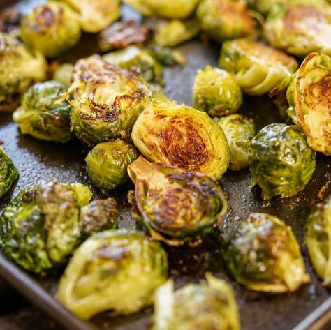 Crispy Oven Roasted Brussels Sprouts are easy to make and so tasty! Baked on a sheet pan they are perfectly caramelized and delicious. It could not be more simple and it's a perfect side dish for any meal! #brusselssprouts #roastedvegetables #vegetarian #vegetables #sidedishrecipes #side #easyrecipe #bowlmeover Roasted Brussel Sprouts Oven, Veggies Roasted, Baked Brussel Sprouts, Crispy Brussel Sprouts, Brussel Sprout Recipes Roasted, Chicory Recipe, Sugar Diet, Roasted Brussel, Roasted Brussels Sprouts