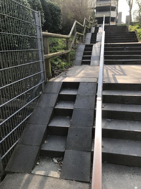 This stairwell near my house has a ramp for wheelchairs/strollers with another staircase for the person pushing them. Ramp On Stairs, Wheelchair Stairs, Ramp And Stairs Architecture, Ramps For Wheelchairs, Stair Ramp, Skatepark Design, Paver Deck, Ramp Stairs, Outside Stairs