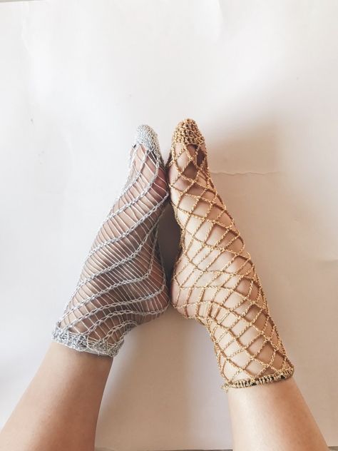 Last week, I posted the pattern to my knitted fishnet socks, and promised a crochet version for all the crocheters out there. The first half of this sock zoomed by, and I was super excited - it was looking fishnetty and was such bliss to crochet.     Then I got to the hem and got stuck for 4 days... the lurex just was not stretch enough to get over my instep and heel, or was too loose and floppy around my ankle. I tried working a front post/back post mock rib, but that was a failure t... Sparkly Fishnets, Crochet Socks Pattern, Fishnet Socks, Crochet Socks, Lace Socks, Sock Patterns, Crochet Shoes, Crochet Slippers, Diy Knitting