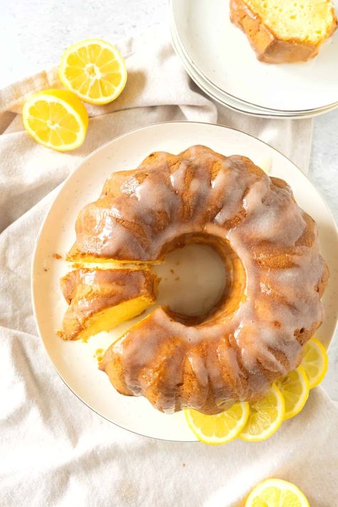 Moist, tender and fragrant with citrus lemon, this gluten-free lemon bundt cake comes together very easily, tastes delicious and is perfect for breakfast, tea time, or an anytime snack! Totally dairy-free too. Gluten Free Bundt Cake, Gluten Free Italian, Lemon Bundt Cake, Dairy Free Yogurt, Gluten Free Sweet, Lemon Pound Cake, Gf Desserts, Gluten Free Sweets, Breakfast Tea