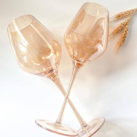 Everyone loves a good wine, these glasses make it even better! Liquid Honey Wine Glasses for enjoying a glass of good wine, special occasion or not. They are hand-blown, sleek, and elegant! Crafted of durable non-lead crystal. Set of 2 glasses     Ships in 3-5 days No Returns