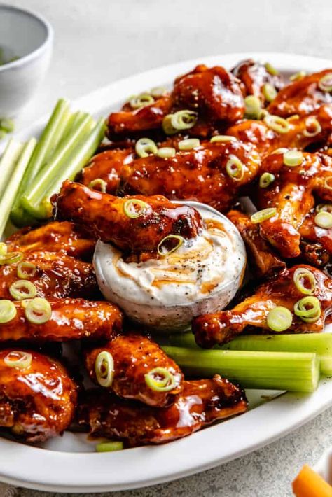 These crispy baked BBQ Chicken Wings are sweet, smoky, saucy, and a little sticky. The wings are baked until perfectly crisp and then tossed in an easy to make honey barbecue sauce. You'll love them! Baked Bbq Chicken Wings, Blue Cheese Dipping Sauce, Bbq Chicken Wings Recipe, Oven Chicken Wings, Barbecue Sauce Chicken, Honey Barbecue Sauce, Bbq Chicken Wings, Honey Barbecue, Baked Bbq Chicken