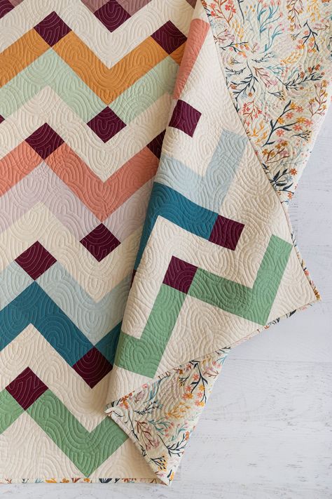 Ready to Elevate Your Quilting Game? Explore this stunning beginner-friendly Thrive Quilt by Suzy Quilts, showcasing fabrics from Signature PURE Solids. With various sizes available, it's the perfect way to level up your quilting skills. Find this quilt pattern and more sewing inspiration in our Lookbook! Let's start stitching. #ArtGalleryFabrics #QuiltsAesthetic QuiltBlocksEasy #CozyQuilts #QuiltDesigns #ModernQuilting #PatchworkQuilting #SewingInspiration #PatchworkQuilts Solid Color Quilts, Easy Quilt Patterns For Beginners, Suzy Quilts, Patchwork Inspiration, Diy Fabric Crafts, Solid Quilt, Signature Quilts, Beginner Quilt Patterns, Cozy Quilts