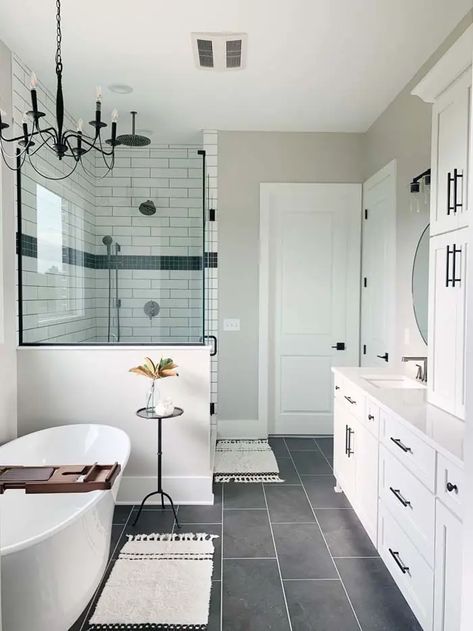 23 Best White Subway Tile Shower Ideas and Designs for 2023 | Decor Home Ideas White Subway Tile Shower Ideas, Tile Bathroom Floor Ideas, Subway Tile Shower Ideas, Black Tile Bathroom, Dark Tile Bathroom, Black Tile Bathroom Floor, Bathroom Floor Ideas, Dark Tile Floors, Tile Bathroom Floor