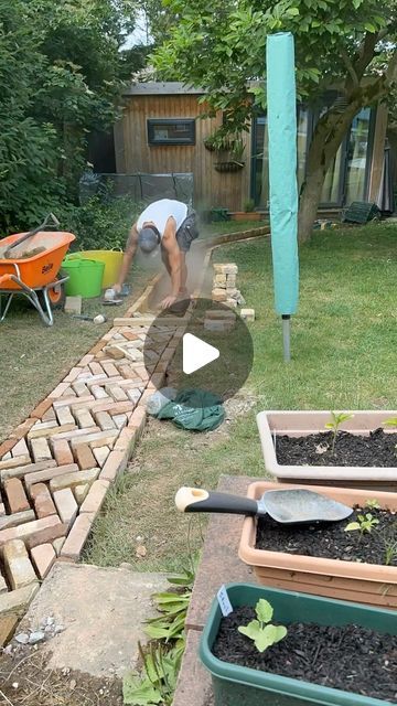 Tom Hall on Instagram: "Reclaimed bricks being laid.  3 slightly different sizes of bricks being laid so abit difficult to get it all matching up but we’re getting round it :)  Any enquiries please get in touch below   📞- 07464 976533  📩 - tgmlandscapes.info@gmail.com  💻 - www.tgmlandscapes.net  #bricks #reclaimed #path #herringbone #lawn #grass #carpenter #summer #gardener #gardening #landscape #landscaper #landscaping #garden #builder #hardwork #landscapegardening #sun #weather #hardwork #building #brickie #bricklayer #driveway #sand #cement #bricks #paving #progression #business" Brick Projects Outdoor, Hoggin Path Garden, Reclaimed Brick Pathway, Brick Path Garden, Pavement Design Paving Pattern, Walking Path Ideas, Reclaimed Brick Garden, Brick Garden Path, Reclaimed Brick Patio