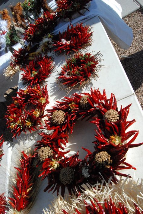 Santa Fe Daily Photo: A Santa Fe Christmas Wreath. This is a beautiful place to be during December. Santa Fe Christmas, Southwest Christmas Decor, Chile Ristra, Chili Peppers Decor, Santa Fe Decor, Southwest Christmas, Traditional Christmas Wreath, Mexico Christmas, Traditional Wreath