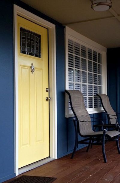 31 Houses With Yellow Front Entry Door Ideas | Sebring Design Build Navy House Yellow Front Door, Yellow Doors On Houses, Red Door Yellow Door, Painting Front Door, Yellow Front Door, Entry Door Ideas, Exterior House Doors, Paint Doors, Blue Sofa Living