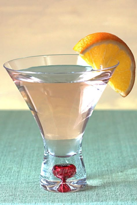 Vodka Martini Recipes, Vodka Orange, Martini Recipes Vodka, Sunrise Cocktail, Cocktail Fruit, Glass Garnish, Orange Bitters, Touch Of Spice, Fruit Cocktail