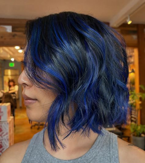 Custom blue lived in highlights and a freshly shaven V cut. ⛓️CLICK THE LINK IN BIO TO BOOK⛓️ . . . . . . . . . #haircoloring #haircolorist #colorspecialist #haircoloringsalon #colorfulhair #sacramentohaircolorist #sachair #sachaircolor #sachaircolorist #916hair #hair #haircolor #midtown #midtownsacramento #amandapadillahair #losanageleshairstylist #shadeseq #alchemysalonandspa #colorcorrection #oliviagardenbrushes #916colorcorrection #blondetransformation #rosevillehairstylist #eastsachair... Blue Peek A Boo Hair, Blue Highlights On Dark Hair, Blue Highlights Short Hair, Blue Bob Hair, Lived In Highlights, 2024 Haircut, Blue Bob, Short Hair Highlights, Blue Ombre Hair