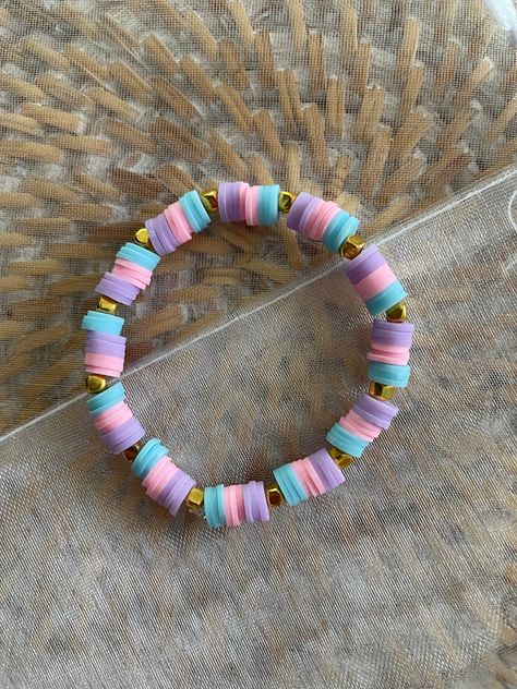 Blue, purple , and pink square beaded bracelet Cheap Blue Friendship Bracelets With Colorful Beads, Purple Bracelet Preppy, Pink And Blue Beaded Bracelets, Purple Beads Bracelets, Make Clay Beads, Bracelet Business, Clay Bracelets, Clay Bead Necklace, Beaded Braclets