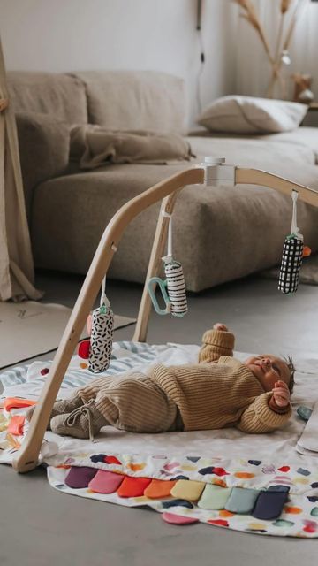 Lovevery on Instagram: "It can be hard to know how to play with a newborn, but we’re here to help! The Play Gym is expertly designed to engage your little one from the start. When lying in the gym, your new baby can stretch out of their womb position, fully extending their arms and legs in all directions. Through movements like these, they’ll begin to sense what each part of their body is doing and where it is relative to the rest of their body and to the floor. Your newborn explores the world Lovevery Play Gym, Play Gym, In The Gym, Baby Play, Child Development, The Start, The Floor, New Baby, Little One