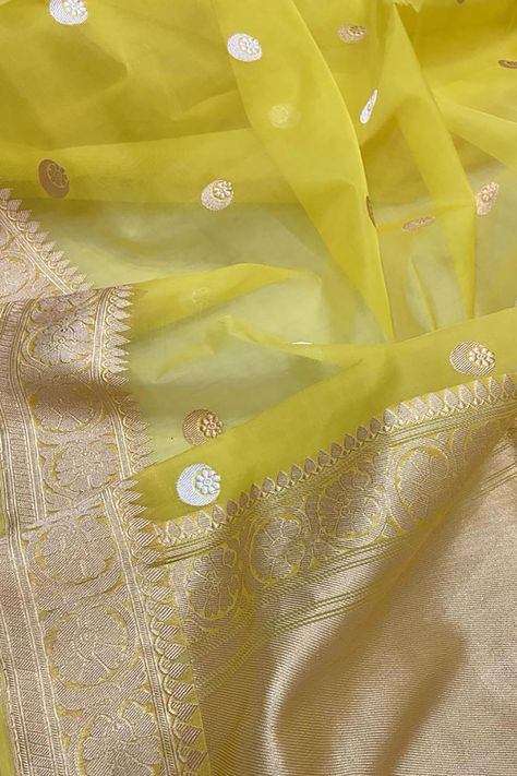 Buy Yellow Banarasi Handloom Kora Silk Saree for only ₹22,500.00 at Luxurionworld! Banarasi Kora Silk Sarees, Kora Banarasi Silk Saree, Elegant Sarees, Kora Silk Sarees, Kanjivaram Sarees Silk, Fabric Paint Diy, New Saree Designs, Bridesmaid Saree, Traditional Dresses Designs