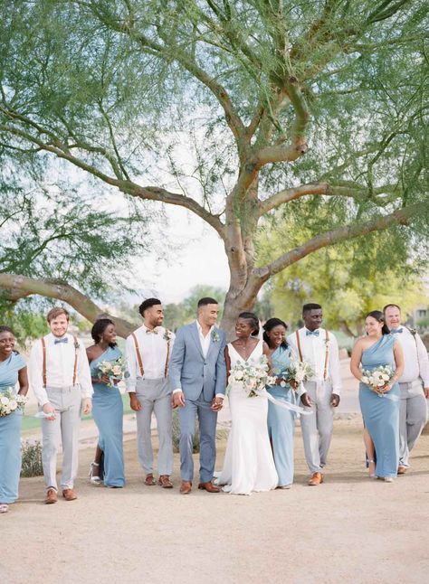 Meet Enyo and Etienne who tied the knot in the Spring of 2021 at Palm Valley in Goodyear, AZ. These love birds were an absolute joy to work with every step of the way. We love how they intertwined elements of their faith and heritage and wrapped it all together with a stunning color palette of dusty blues, creams, and rose gold accents. Every detail was so thoughtfully chosen and perfectly accented the stunning mountain views that captured the bride and groom's hearts. Join us as we reminisce ab Groom Attire Light Blue, Light Blue Suit Wedding Party, Mix And Match Wedding Party, Light Blue Wedding Groomsmen, Light Blue Wedding Party Attire, Beach Bridal Party Attire, Bridal Party Attire Color Schemes, Summer Wedding Party Attire, Beach Wedding Groomsmen Attire