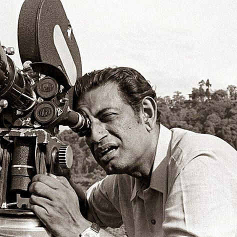 Satyajit Ray (1921-1992) was a pioneering Bengali filmmaker known for his transformative impact on Indian cinema through films like "Pather Panchali" (1955) and the Apu Trilogy. Beyond filmmaking, Ray excelled as a writer, music composer, and graphic designer, portraying Bengali culture and universal human experiences. His work earned international acclaim, influencing filmmakers worldwide and solidifying his legacy as a cultural icon. Satyajit Ray, Ray Film, National Film Awards, Time Magazine, Movie Collection, Art Style Inspiration, Film Awards, Film Director, Film Serie