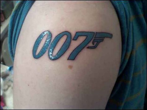 Can't go wrong with a classic | 15 Of The Best (And Worst) James Bond Tattoos 007 Tattoo Ideas, James Bond Tattoo Ideas, James Bond Logo Design, James Bond Drawing, Minion Tattoo, James Bond No Time To Die, Jewel Tattoo, Flying Tattoo, Piercing Shop