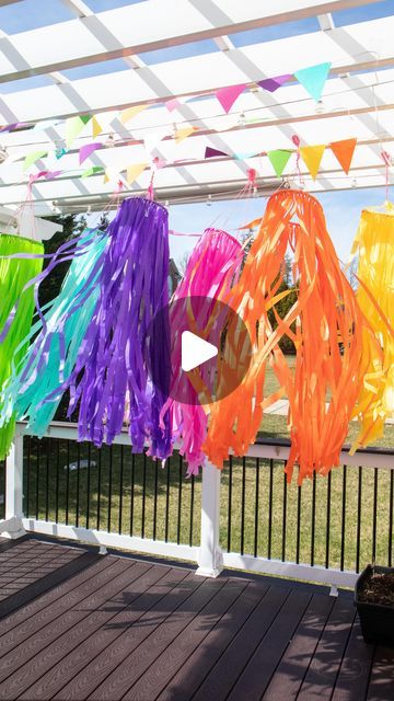 Mitesh | Home & Design on Instagram: "Sharing a cheap an easy decor idea for your Holi party. I used plastic table covers and 10” embroidery hoops to create these hanging pieces. I grouped various colors together just like the colors of Holi. Each table cover is enough for a 9 or 10” embroidery hoop and I used both inner and outer hoop to create 2. I then tied some yarn to create hangers and they were ready to go. The wind picked up and the last shot just feels like a party. These are waterproof and store easily so will definitely be bringing them out each year. . The felt pennant banner is from Amazon. I was going to DIY this but was much cheaper and better readymade. . Table covers @partycity  Embroidery Hoops @michaelsstores  . . . . . . . . . #holidecor #holi #holidecoration #holifesti Holi Party, Holi Festival Of Colours, Easy Decor, Last Shot, Pennant Banner, Plastic Table Covers, Felt Pennants, Plastic Table, Holi Festival