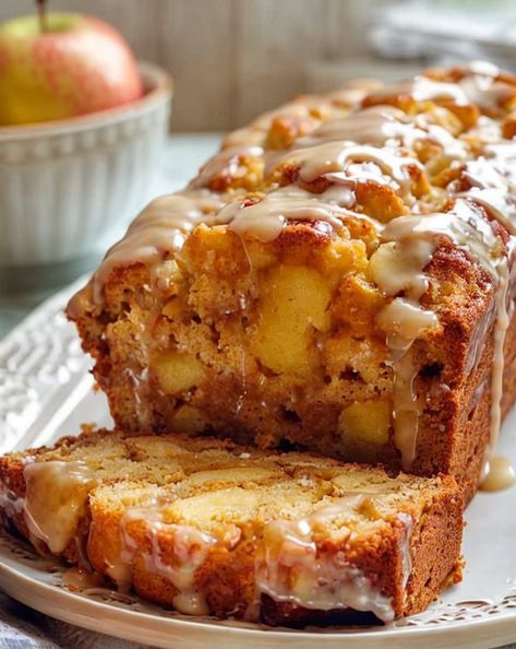 Indulge in this moist, buttery Country Apple Fritter Bread, packed with cinnamon-sugar swirls and juicy apple chunks. Perfect fall treat! 🍏🍞 #AppleBread #FallBaking #ComfortFood #HomemadeDelights #AppleRecipes Apple Fritters Cake Recipe, Recipes Tower, Fritter Bread Recipe, Apple Fritter Bread Recipe, Apple Fritters Bread Recipe, Country Apple Fritter Bread, Optimal Recipes, Apple Cinnamon Loaf, Apple Fritter Cake