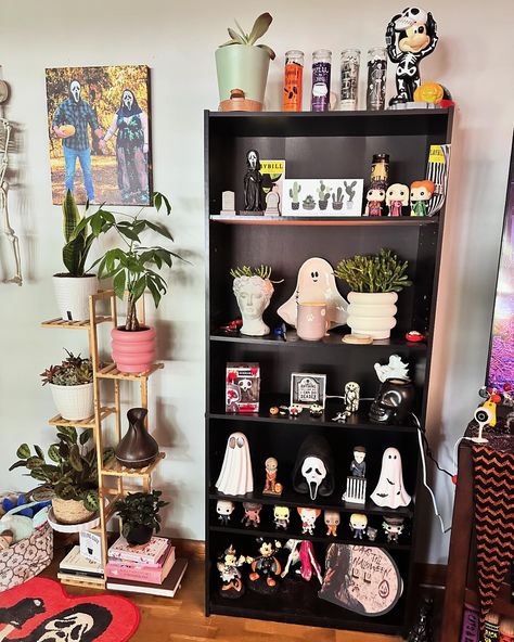 My favorite little spot in our movie room 💕 my horror shelf and my plant shelf. 🦴🪴 if only I had more 😂 Cube Shelf Decor Aesthetic, Horror Shelf, Movie Shelf, Artistic Bedroom, Horror Room, Artist Bedroom, My Plant, Dark Home Decor, Plant Shelf