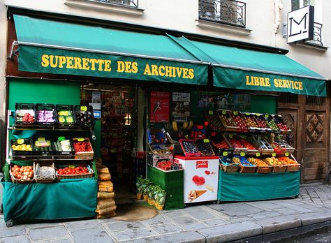 Paris market Paris Supermarket, Paris Markets Shopping, Village Grocery Store, Local Supermarket, Paris Antique Market, Produce Stand, Market Table, Paris Markets, Fruit Shop