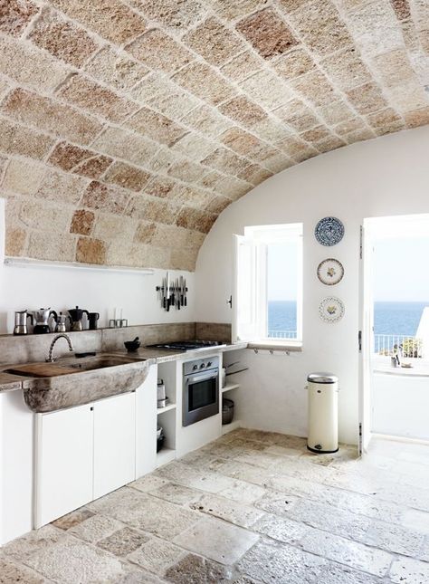 Kitchen in Puglia, Italy via Kinfolk | Remodelista Italian Kitchen Design, Stone Walls Interior, Homes In Italy, Smart Tiles, Stone Walls, Rustic Kitchen Decor, Italian Kitchen, Design Del Prodotto, Style At Home