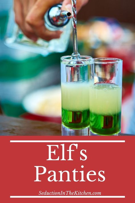 Looking for a Christmas cocktail? Elf’s Panties is a Christmas vodka cocktail! This layered drink has creme de menthe and white chocolate liqueur to make it a yummy peppermint drink! | SeductionInTheKitchen.com #christmascocktail #cremedementhe #christmasdrink #layeredshot Peppermint Snapps Drinks Recipes, Elf Inspired Cocktail, Santa Hat Drink, Green Christmas Cocktails Holiday Drinks, Elf Movie Themed Cocktails, Santa Panties Drink, Tipsy Elf Cocktail, Green Christmas Drinks Alcohol, Elf Themed Cocktails