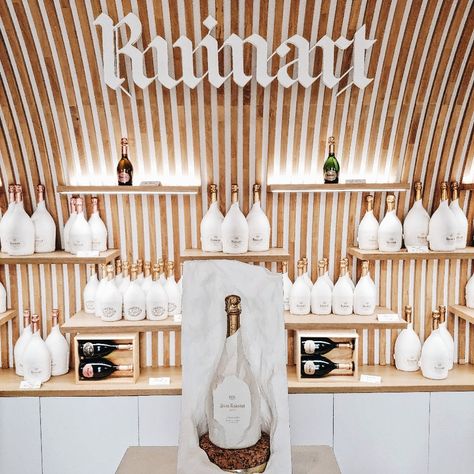 An Enchanting Ruinart Visit: Into the Crayères and Tasting - Champagne Shelf Display, Wine Pop Up Store, Wine Shop Display Store Design, Winery Merchandise Display, Winery Retail Display, Bottles Packaging, Promotion Display, Installation Ideas, Small Apartment Building