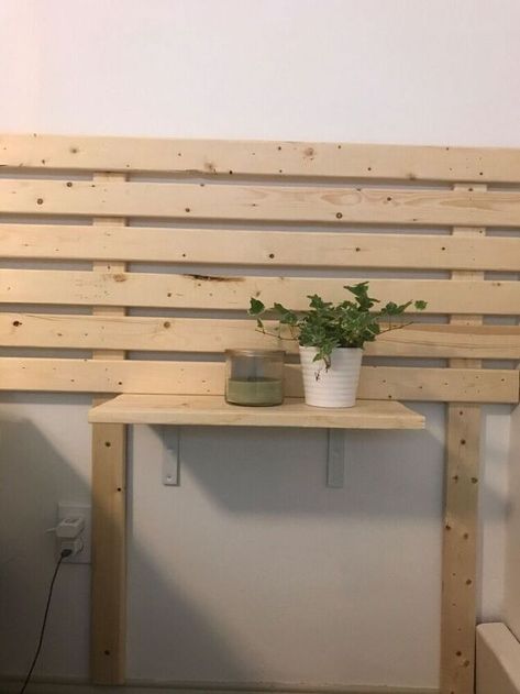 Wood slat walls are all the rage right now. I absolutely love the ambiance it adds to rooms, so I created my own take on it to add something beautiful to our bedroom. Before For this project, we decided to use some 1x3x8 boards. Generally wood slay walls are made with 1x2s, but while at the store we saw these boards and fell in love with the dark knots in them.First we cut five boards to 3 1/2’ tall.These will be the boards we use to attach the wood slats to so be sure you screw… Slat Wall Shelves, Headboard With Floating Nightstands, Wood Slat Headboard, Minimalist Headboard, Mcgee Bedroom, Shed Decorating Ideas, She Shed Decorating Ideas, Slat Headboard, Aging Terra Cotta Pots