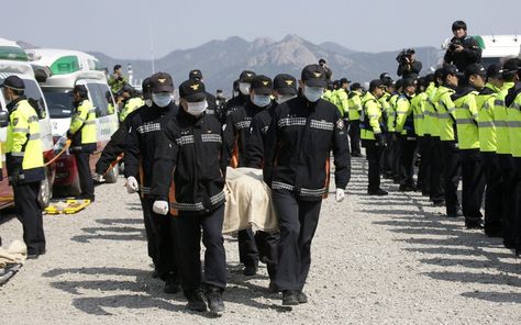 South Korea ferry disaster: divers bring out the dead as hope of survivors lost - Telegraph Sewol Ferry, Bringing Out The Dead, Astro Jinjin, Current Events, Diver, The Dead, South Korea, Anger, Winter Jackets