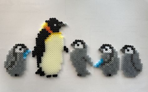 Penguin mother and babies perler beads Perler Beads Penguin, Penguin Perler Bead Patterns, Penguin Perler Beads, Melt Beads Patterns, Christmas Perler Beads, Pony Bead Projects, Penguin Crafts, Perler Creations, Pearl Beads Pattern