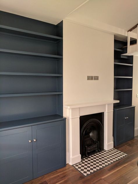 Built In Alcove Cupboards And Shelves, Tv Wall Alcove, Blue Alcove Shelves, Dark Blue Alcoves, Wallpaper For Alcoves, Dark Alcove Shelving, Alcove Shelving Kitchen, Painted Shelves Around Fireplace, Dark Blue White Living Room