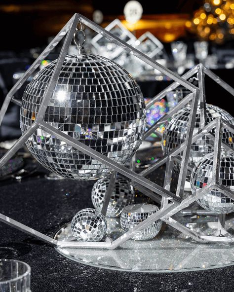 An Unforgettable Disco Themed Gala Dinner at the Dubai Opera – Party Social Disco Party Food Table, Disco Theme Table Decor, Disco Banquet, Disco Holiday Party, Disco Party Table Decorations, Disco And Diamonds Party, Disco Party Centerpieces, Futuristic Theme Party, Disco Party Centerpiece Ideas