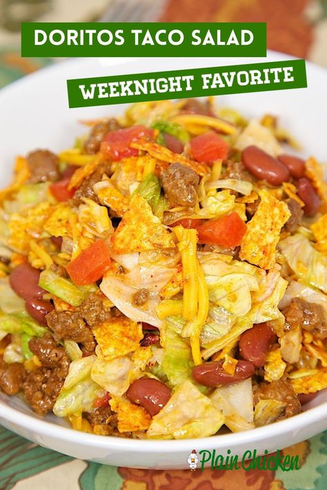 Doritos Taco Salad Recipe – taco meat, kidney beans, tomatoes, lettuce, Catalina dressing, cheese and Doritos. Quick Mexican recipe. Kid-friendly – who wouldn’t want to eat Doritos for dinner?! Taco Salad Recipe With Catalina Dressing, Doritos Taco Salad Recipe, Quick Mexican Recipes, Doritos Taco Salad, Dorito Taco Salad Recipe, Taco Salad Doritos, Catalina Dressing, Doritos Taco, Kid Friendly Meals Dinner