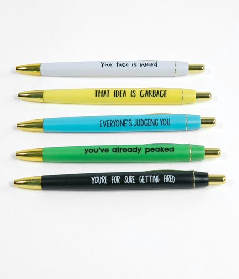 Keep their egos in check! This set of five ballpoint retractable pens come in lovely colors of blue, yellow, white, green, and black and boast a variety of demotivational quotes, “Everyone’s Judging You, You’ve Already Peaked, That Idea Is Garbage, You’re For Sure Getting Fired, Your Face Is Weird”. With golden hardware, the perfect gift for the loser in you life!Available while supplies last. Demotivational Quotes, Cubicle Office, Office Marketing, Pen Designs, Gift Ideas For Anyone, Ideas For Presents, Work Flow, Personalised Pens, Secret Gift Ideas