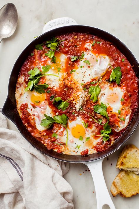 Eggs in purgatory is soft-cooked eggs in a spicy tomato sauce. This Italian shakshuka recipe uses a handful of ingredients and is perfect for brunch! Eggs In Purgatory, Shakshuka Recipes, Spanish Recipes, Spicy Tomato Sauce, Big Breakfast, Spice Jar, Egg Dish, Boiled Egg, Easy Dinners