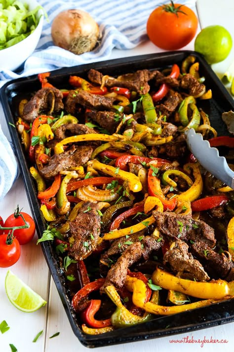 These Easy Sheet Pan Steak Fajitas make the perfect simple and healthy weeknight meal for busy families! Made with lean beef, fresh veggies and your favourite Mexican-style fixings! Recipe from thebusybaker.ca! #fajitas #mexican #steak #beef #healthy #familymeal #mealprep #easymeal #recipe #easy #texmex #foodblog One Pan Steak And Veggies, One Pan Fajitas Steak, Cho Main Recipe, Steak Fahijatas Recipe, Sheet Pan Steak Fajitas, Steak And Veggies, Beef Fajita Recipe, Sheet Pan Steak, Mexican Steak