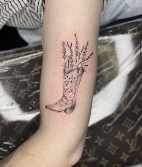 Western Fine Line Tattoo Ideas, Cowboy Boots Tattoo For Women, Cowboy Boot With Flowers Tattoo, Cowboy Boots Tattoo, Cowboy Boot Tattoo, Lilac Tattoo, Cowboy Tattoos, Cowgirl Tattoos, Lavender Tattoo