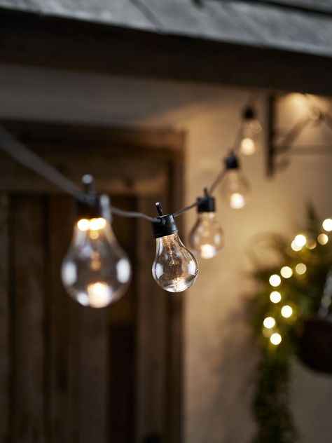 Set the mood Festoon Lighting Garden, Lighting Your Garden, Urban Courtyards, Outdoor Lighting Ideas, Festoon Lights, Cool Fire Pits, Outdoor Fairy Lights, Minimalist Garden, Patio Wall