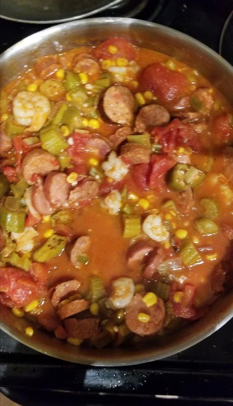 A great Southern okra dish made with andouille sausage, corn, tomatoes, onions, and celery. Creole Okra And Tomatoes, Crockpot Okra Recipes, Southern Okra Soup Recipes, Tomato Okra Recipe, Stewed Okra And Tomatoes With Sausage, Okra Creole Recipe, Recipes With Okra In It, Okra And Tomatoes Southern Recipe, Okra And Tomatoes Southern